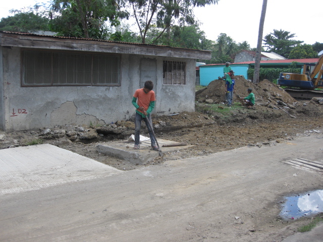 men working on the road